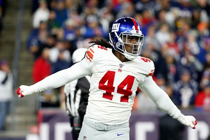 Oct 10, 2019; Foxborough, MA, USA; New York Giants linebacker Markus Golden (44) reacts after a sack on New England Patriots quarterback Tom Brady (12) during the first half at Gillette Stadium.